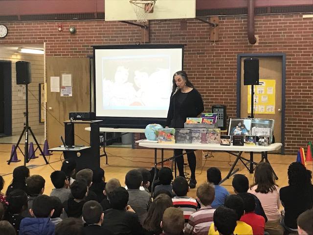 Author Norah Dooley speaking to students